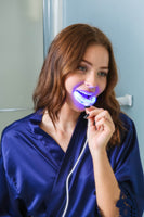 "Looking for a teeth whitening solution that's convenient, effective, and easy to use? Our smart LED whitening kit is the perfect choice - with built-in technology that accelerates the whitening process and a 16-minute timer for maximum convenience, you can get the results you want anytime, anywhere."
